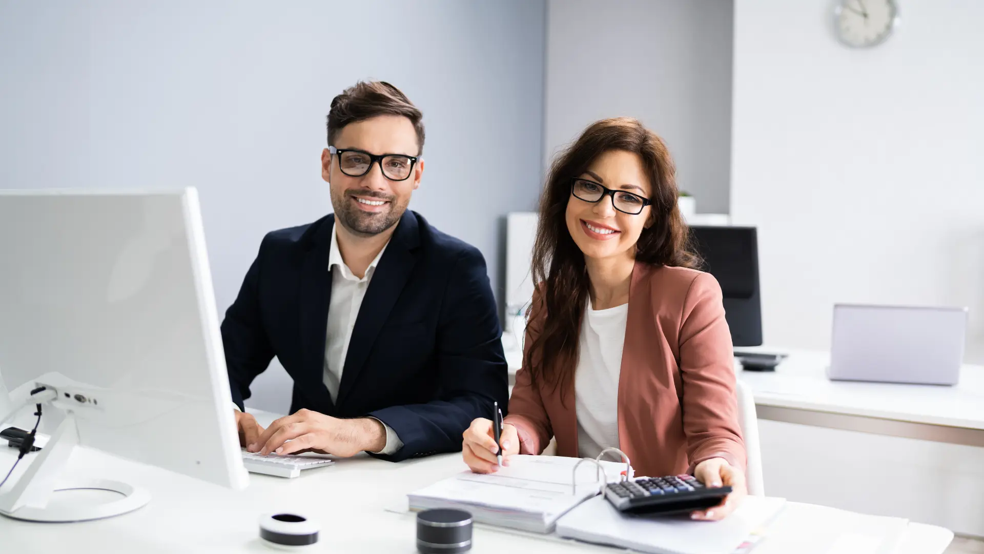 Colleagues discussing business structure in an office